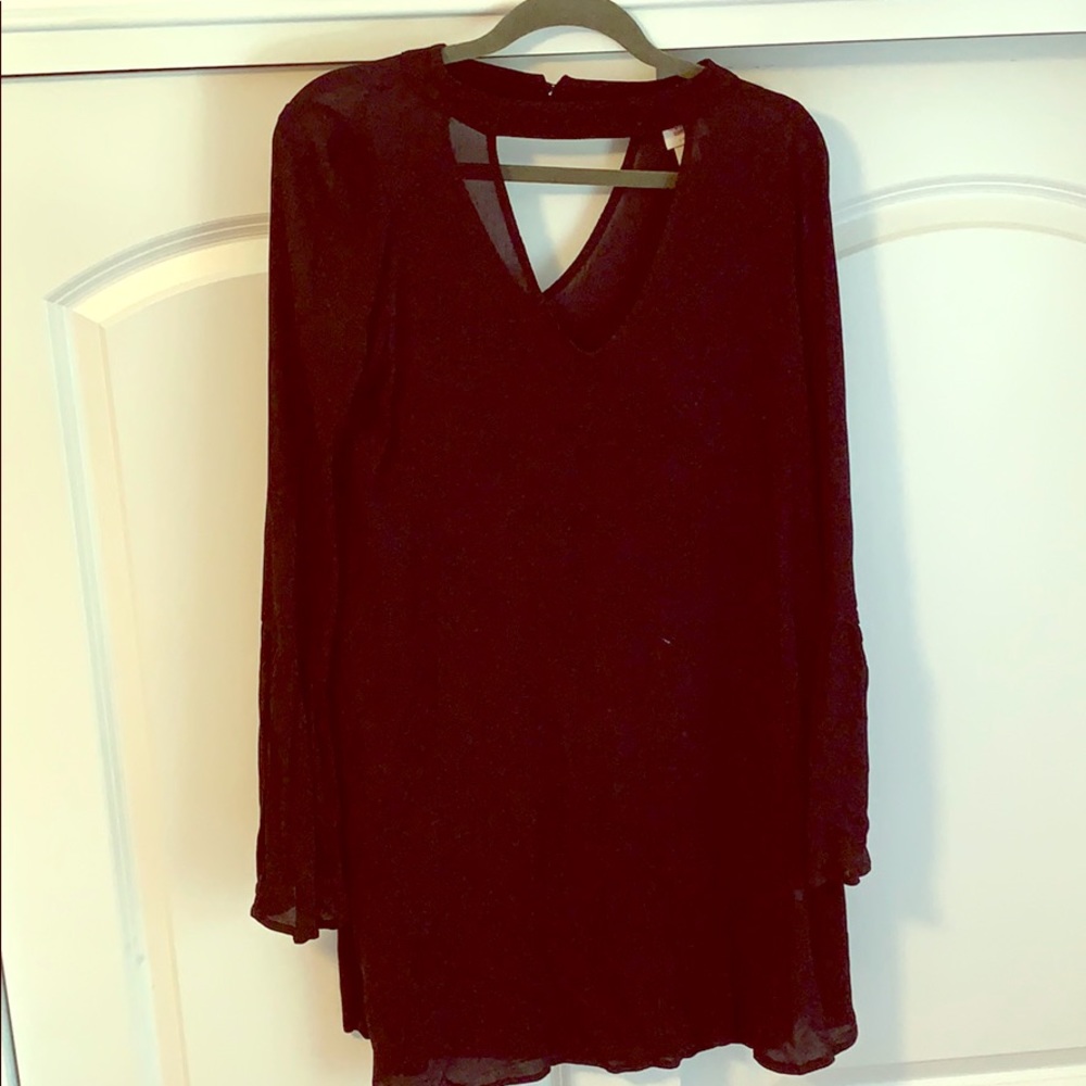 Black long sleeve dress with bell sleeves